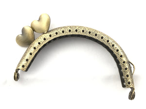 Clic clac corazón 8,5 cm cf.1pz